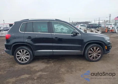 2014 Volkswagen Tiguan Sel z USA, uszkodzony, nr VIN WVGBV3AX2EW525813